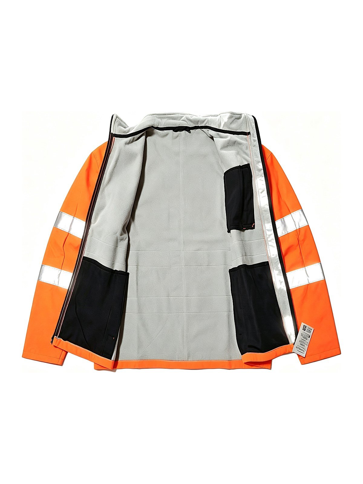 Softshell jacket opened up, showing fleece lining and inner pockets