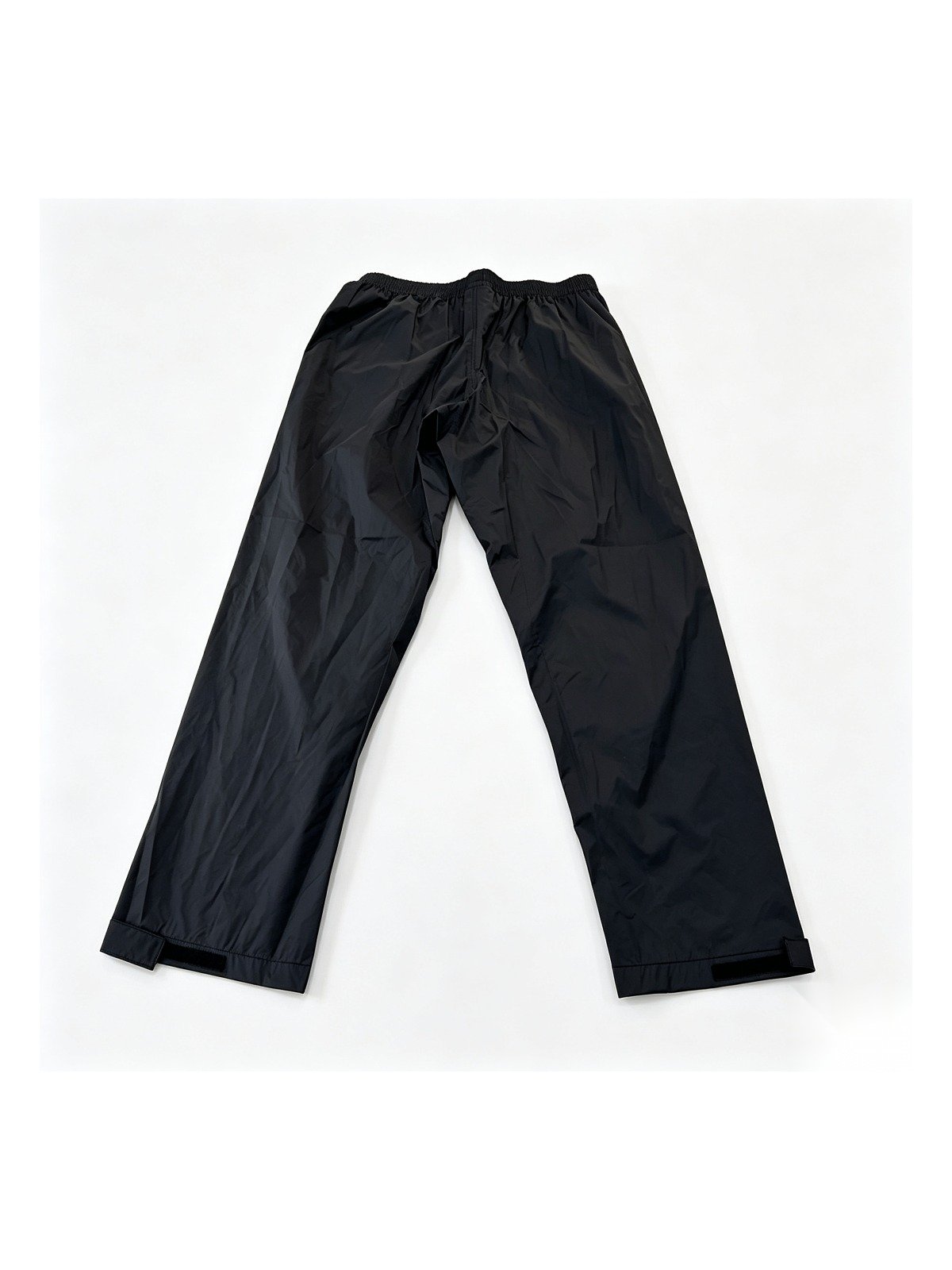 Rain pants, back view with Velcro ankle adjusters
